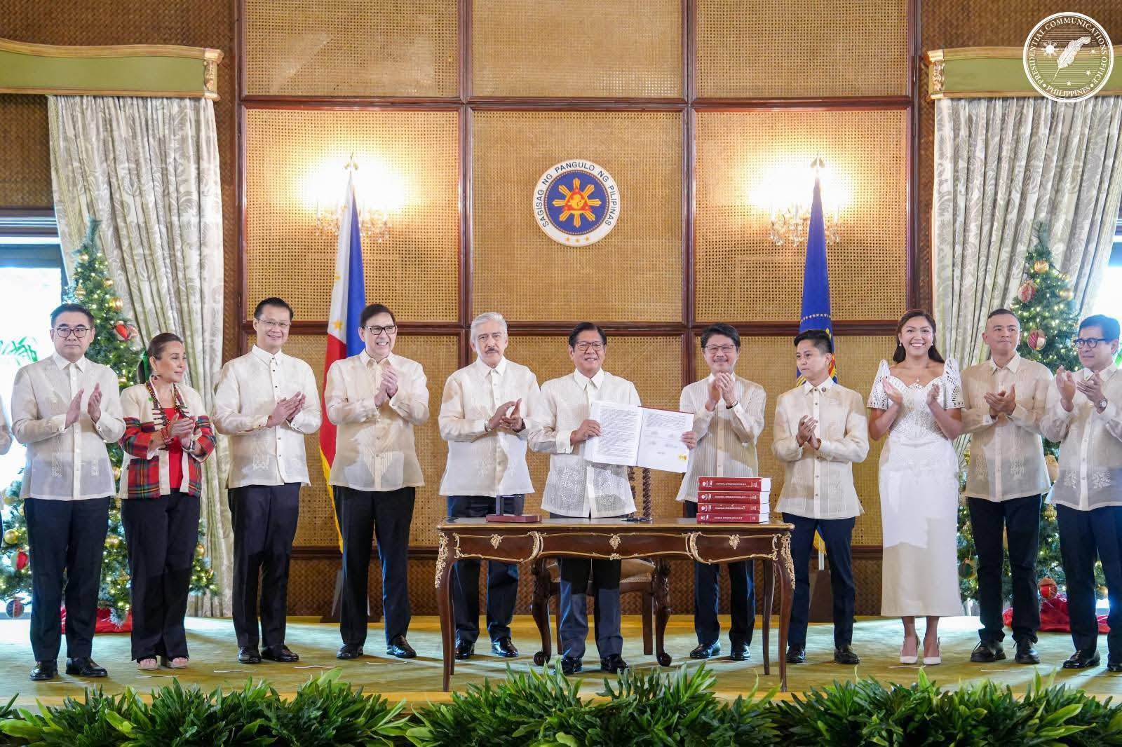 Marcos signs budget